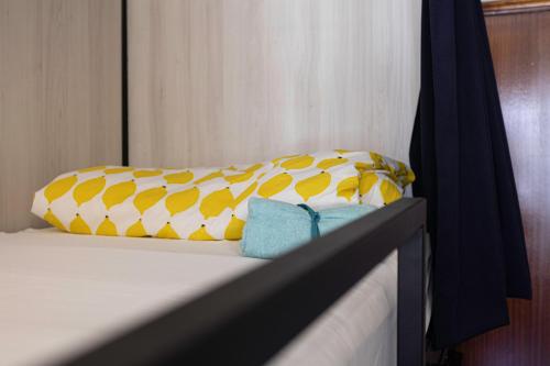 Кровать или кровати в номере Lemon Hostel Faro