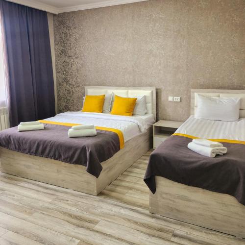 Postel nebo postele na pokoji v ubytování Bayotel