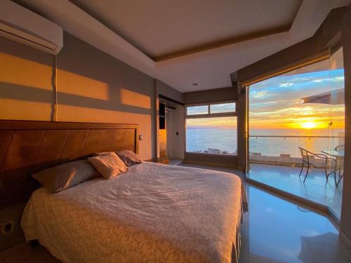 Ένα ή περισσότερα κρεβάτια σε δωμάτιο στο Villas san Sebastián