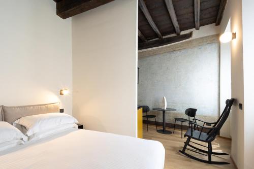 Ένα ή περισσότερα κρεβάτια σε δωμάτιο στο Residenza San Valerio