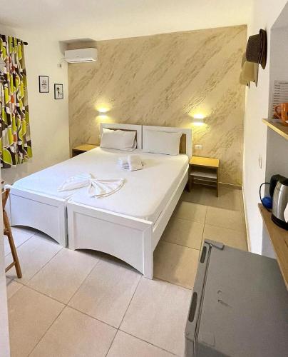Llit o llits en una habitació de Harmony Central