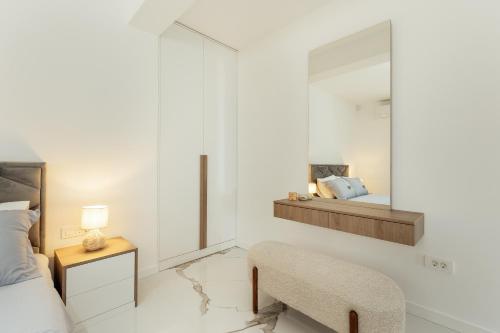 Postel nebo postele na pokoji v ubytování Savina Beachfront Oasis