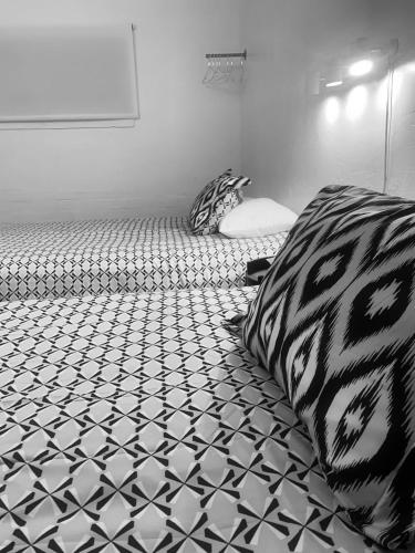 Ένα ή περισσότερα κρεβάτια σε δωμάτιο στο Dragonfly Motor Lodge