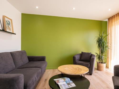 Χώρος καθιστικού στο Holiday Home La Roselière by Interhome