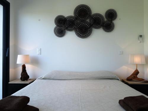 Ένα ή περισσότερα κρεβάτια σε δωμάτιο στο Apartment Les Jardins d'Ève- F3 by Interhome