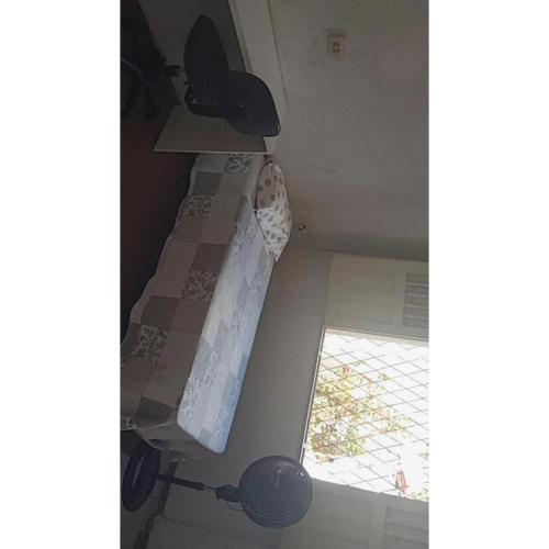 a view from the top of a room with a window at Hostel Teresina in Teresina