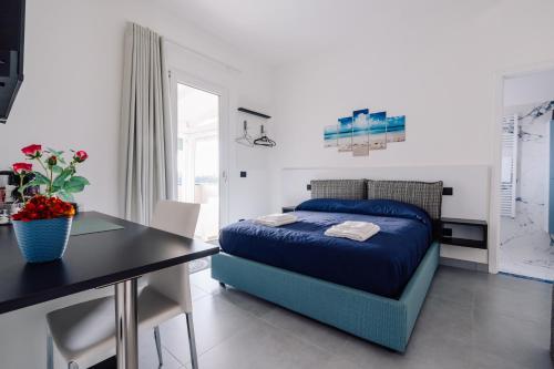 Postel nebo postele na pokoji v ubytování B&B Insonnyroom