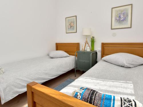 Postel nebo postele na pokoji v ubytování Holiday Home Ivan by Interhome