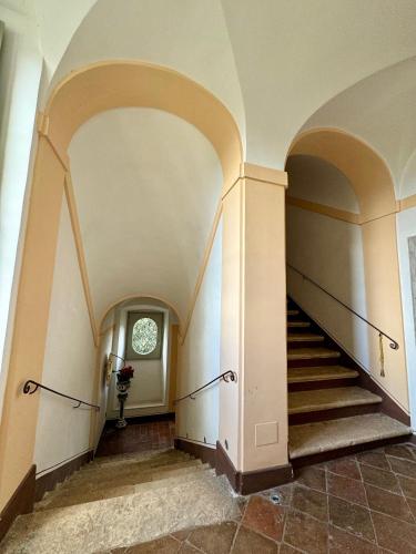 an empty hallway with stairs in a building at Villa Dell'Annunziata in Rieti