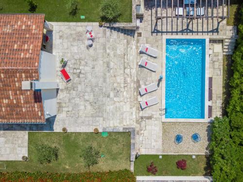 an overhead view of a swimming pool in a yard at Holiday Home Villa Samanta by Interhome in Momjan