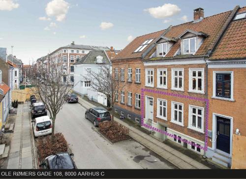 an aerial view of a city street with buildings at Ole Rømers Gade 108 in Aarhus
