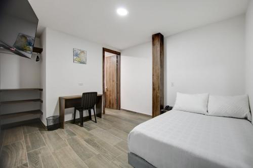 Postel nebo postele na pokoji v ubytování Xliving Host and Rooms