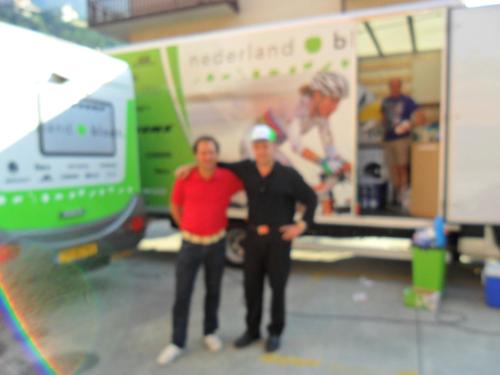 two men standing in front of a moving truck at Albergo Motel Dosdè B&B in Grosio