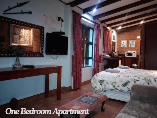 Una cama o camas en una habitación de Bayete Self Catering