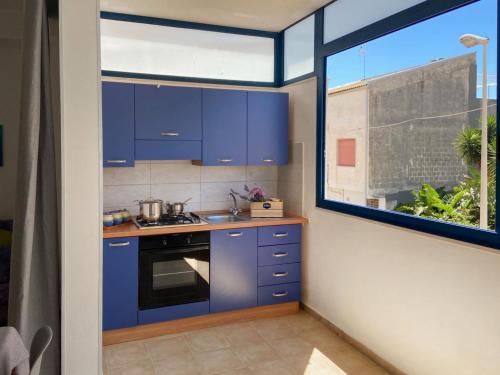 Kuchyňa alebo kuchynka v ubytovaní Apartment Sole by Interhome