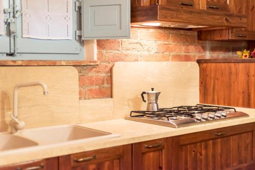 Kuchyň nebo kuchyňský kout v ubytování Fattoria Le Giare Agriturismo