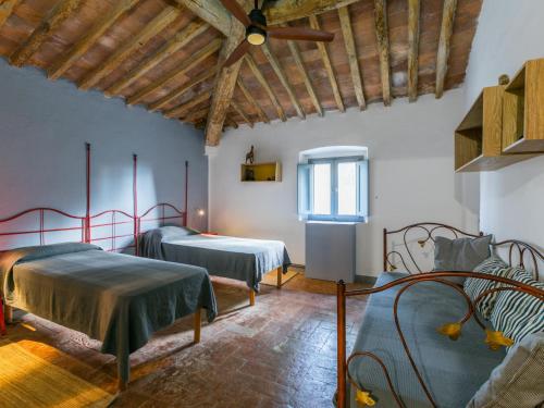Ένα ή περισσότερα κρεβάτια σε δωμάτιο στο Holiday Home Saletto by Interhome