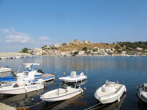 a group of boats docked in a body of water at Holiday Home Terrazza del Sud by Interhome in Porto Palo