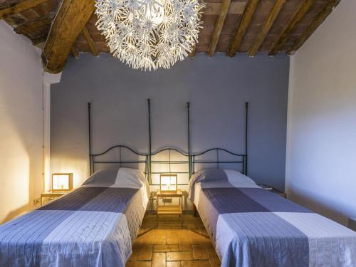 Ένα ή περισσότερα κρεβάτια σε δωμάτιο στο Holiday Home Saletto by Interhome