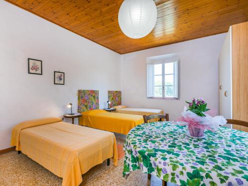 Postel nebo postele na pokoji v ubytování Holiday Home La Madonnina x 17 pax by Interhome