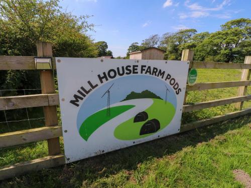 a sign for a mill house farmrot on a fence at Mallard View in Lancaster