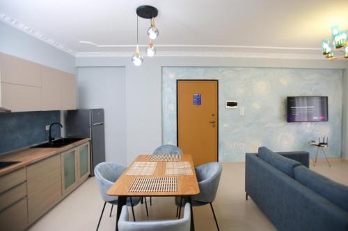 Kuchyň nebo kuchyňský kout v ubytování Oasis Residence