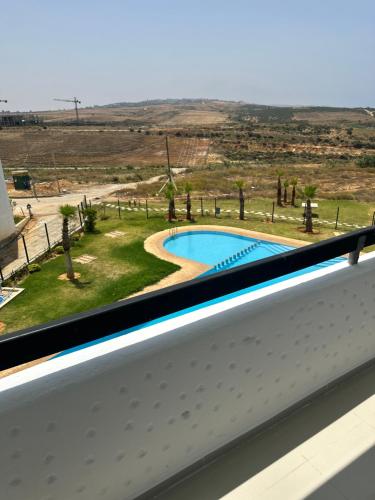 Πισίνα στο ή κοντά στο Marina golf 1 chambre vue piscine et partie mer