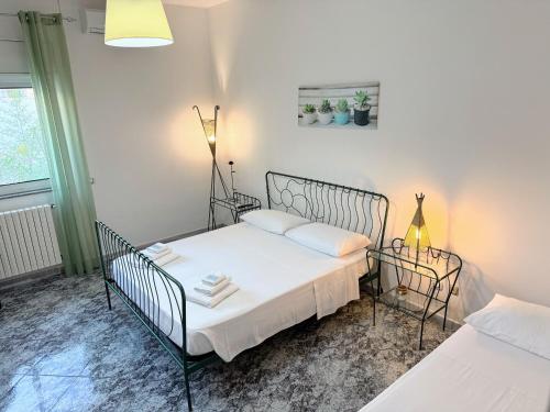 Postel nebo postele na pokoji v ubytování B&B Civico 42
