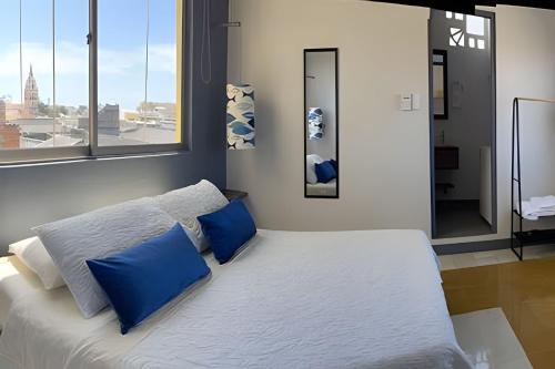 Ένα ή περισσότερα κρεβάτια σε δωμάτιο στο 417 Apto con vista panorámica de cgna