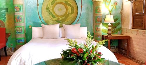 Postel nebo postele na pokoji v ubytování Hotel Secreto