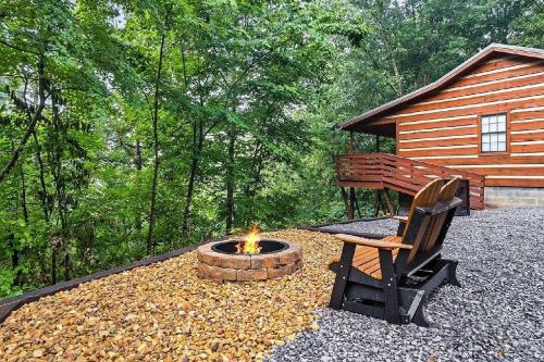 a fire pit in the middle of a yard with a bench at Romantic, Private Cabin in Smokies Hot Tub Firepit in Sevierville