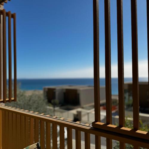 a view of the ocean from a balcony at Seanest Greencoast in Himare