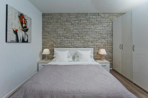 Ένα ή περισσότερα κρεβάτια σε δωμάτιο στο Hvar Pavičić Top View apartments