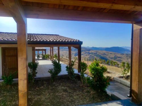 a view from the porch of a house at MonteSoprano Agriturismo - Resort - Spa - Gym -Camping - Suite in Capizzi