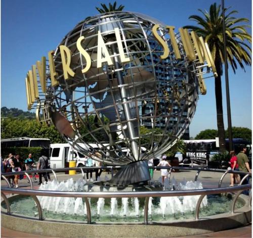 a large ferris wheel in a park with water fountain at Spacious Hollywood Home Sunset View-Free Parking 10mins to Universal Studios in Los Angeles