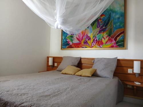 Una cama o camas en una habitación de Bel appartement familial