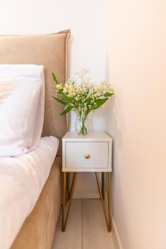 Katil atau katil-katil dalam bilik di Apartamenty Centrum Rewal