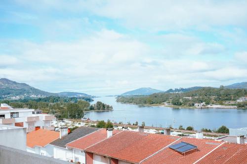 a view of a river from a city at Férias em Cerveira in Vila Nova de Cerveira