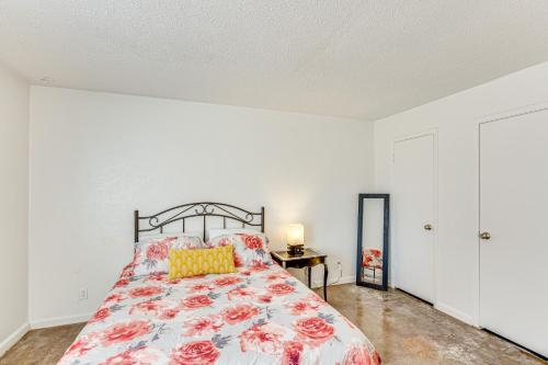 a bedroom with a bed and a table at Dallas Condo in Walkable Knox Street District! in Dallas