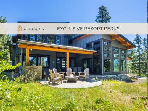 a house in the woods with a sign that reads exclusive resort perks at Suncadia 5 Bdrm Home Perfect Private Retreat in Cle Elum