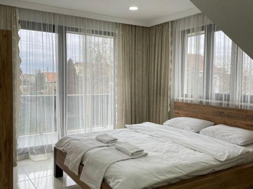 Postel nebo postele na pokoji v ubytování Villa Mjora