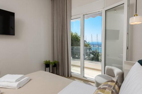 Giường trong phòng chung tại Oasis Boutique Apartment