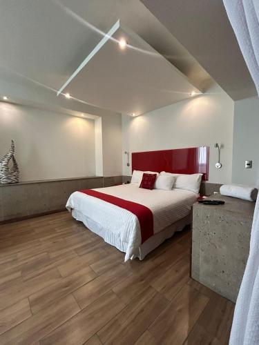 Postel nebo postele na pokoji v ubytování Zújmú Business Boutique Hotel