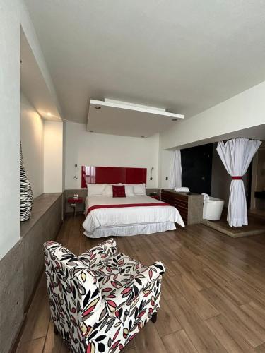Postel nebo postele na pokoji v ubytování Zújmú Business Boutique Hotel
