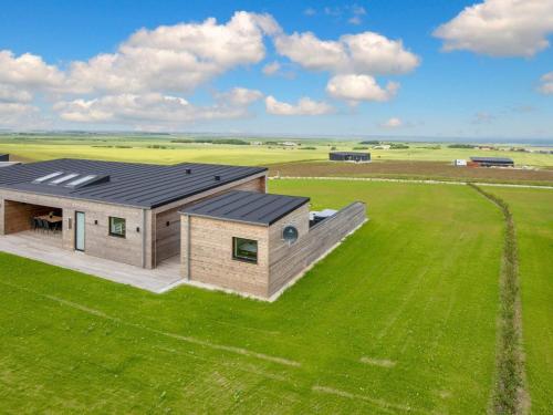 an overhead view of a house in a field at 5 star holiday home in Lemvig-By Traum in Lemvig