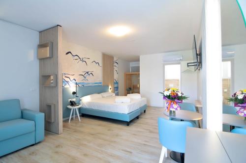 Ένα ή περισσότερα κρεβάτια σε δωμάτιο στο Marina Junior Suite 4 Stelle S
