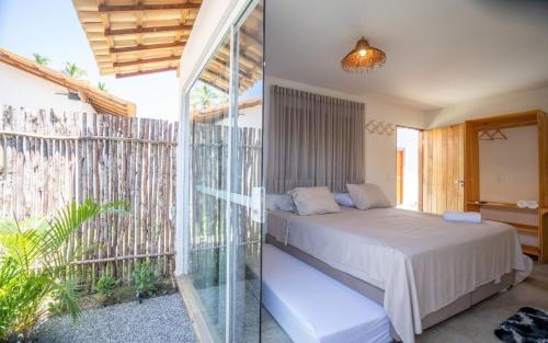 Postel nebo postele na pokoji v ubytování Villa Nahum - Chalés - São Miguel dos Milagres