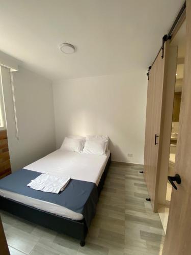 Postel nebo postele na pokoji v ubytování Apartamento en Villeta-Cundinamarca