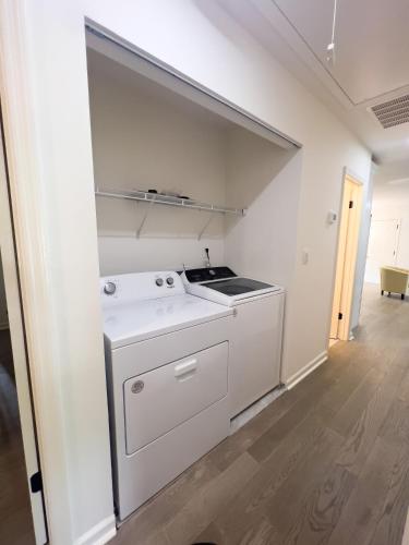 a kitchen with a white stove in a room at Cozy Contemporary Bungalow in Decatur