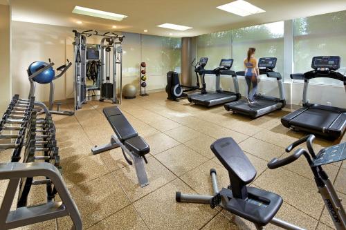 a fitness room with treadmills and cardio machines at DoubleTree by Hilton LAX - El Segundo in El Segundo
